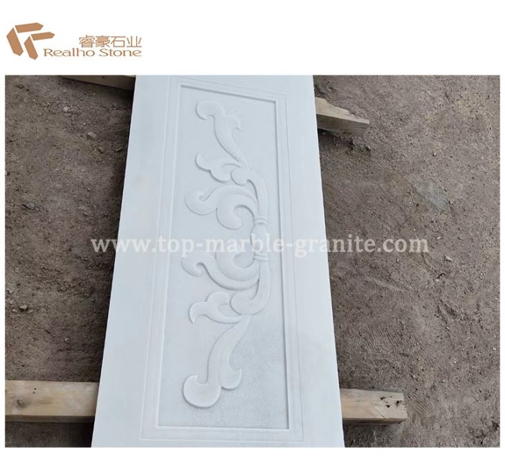white marble carving with flower