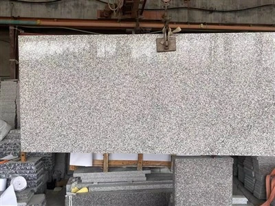 Granite Tonb Blan Ak Nwa